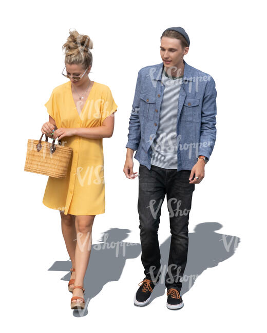cut out man and woman in a yellow dress walking seen from above