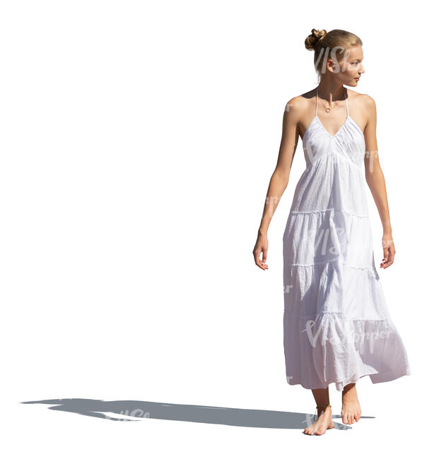 cut out woman in a white summer dress walking barefoot