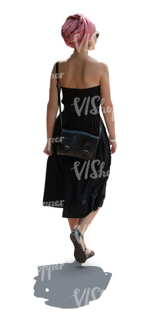 cut out woman in a black summer dress wearing headscarf walking