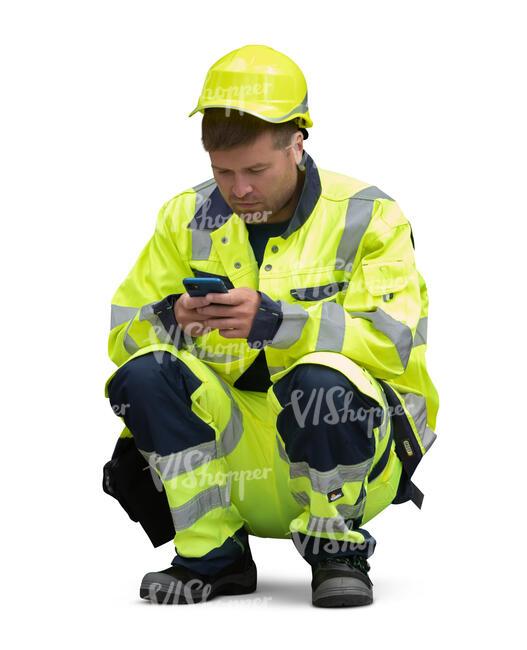 cut out worker on a break squatting and texting