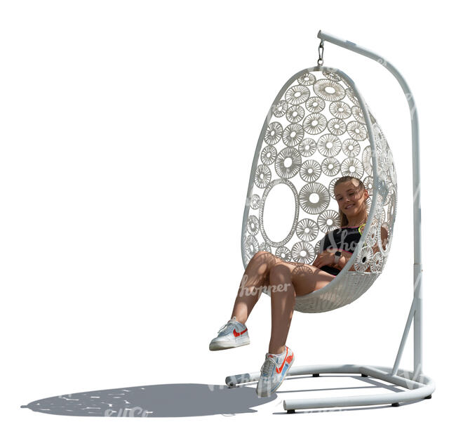 cut out teenage girl sitting in a white hanging chair