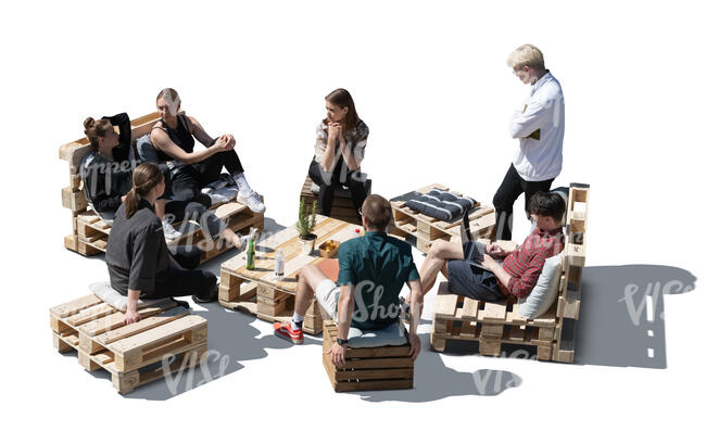 cut out group of friends sitting on pallet garden furniture