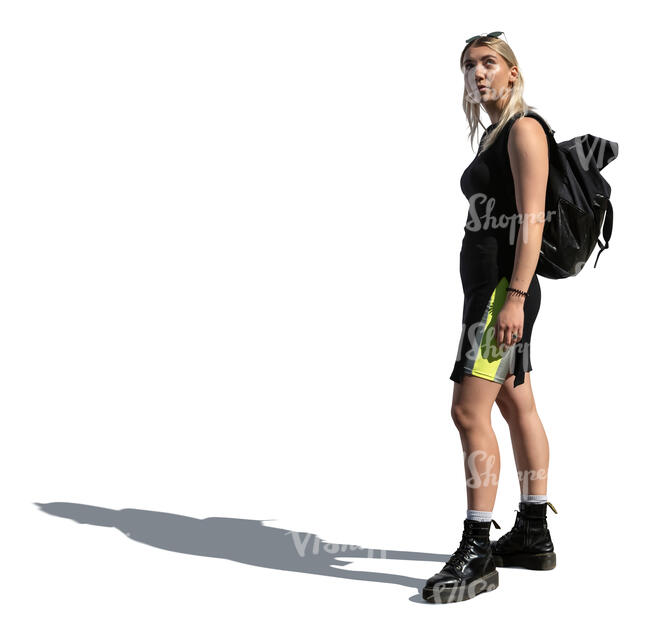 cut out young woman with a backpack standing