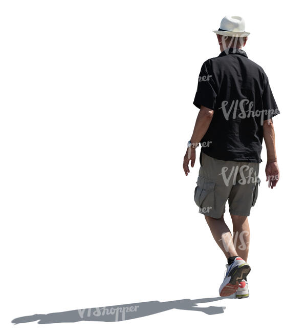 cut out elderly backlit man walking in summer