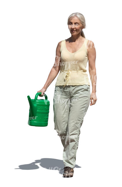 cut out elderly lady with a watering can walking