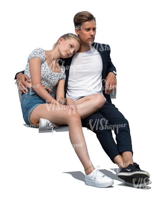 cut out young couple sitting