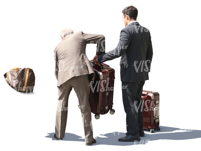 hotel porter and taxi driver loading bags in the trunk
