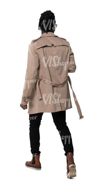 cut out man in a brown trenchcoat walking