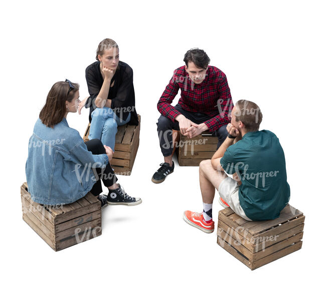 cut out top view of four young people sitting on wooden boxes