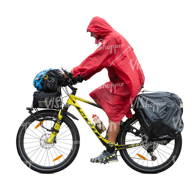 cut out man with a raincoat and hiking bags riding a bicycle