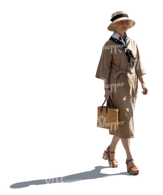 cut out elderly lady in a beige dress walking