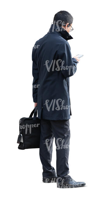 cut out businessman in a black overcoat standing