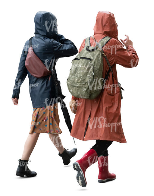 two cut out women wearing raincoats walking