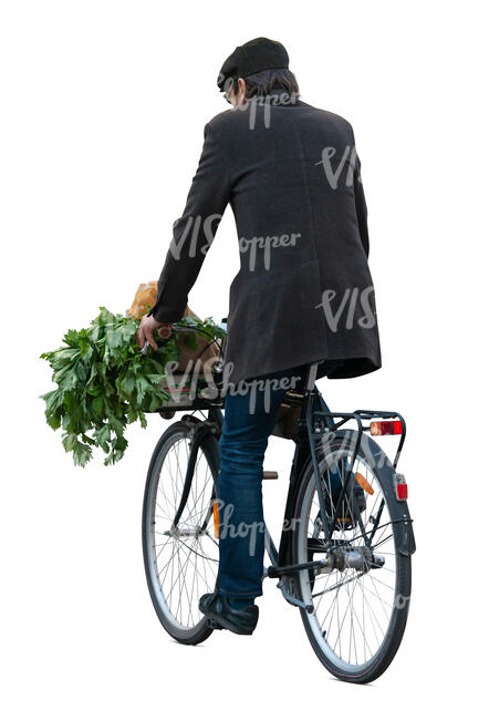 cut out man riding a bike home from groceries shopping