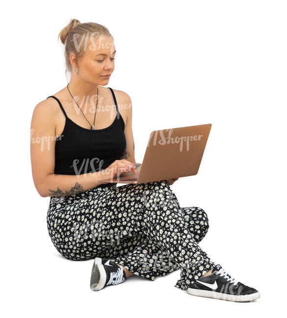 cut out woman with a laptop sitting on the ground