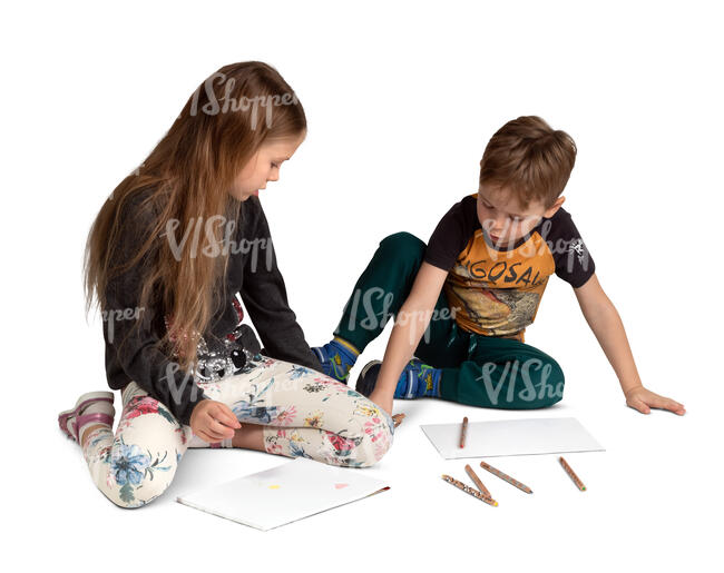 two cut out kids sitting on the floor and drawing