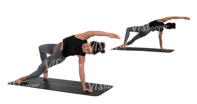 cut out woman doing yoga in front of  the mirror