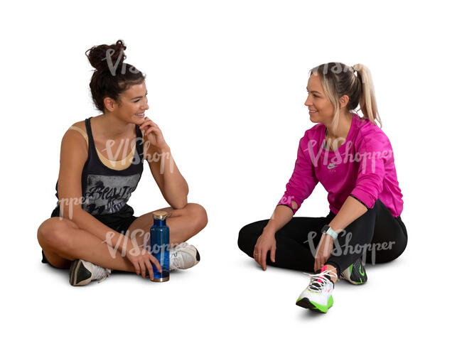 two cut out women sitting and talking after workout