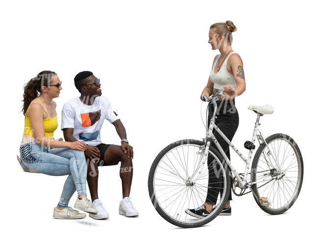 two cut out people sitting and talking to a woman with a bike