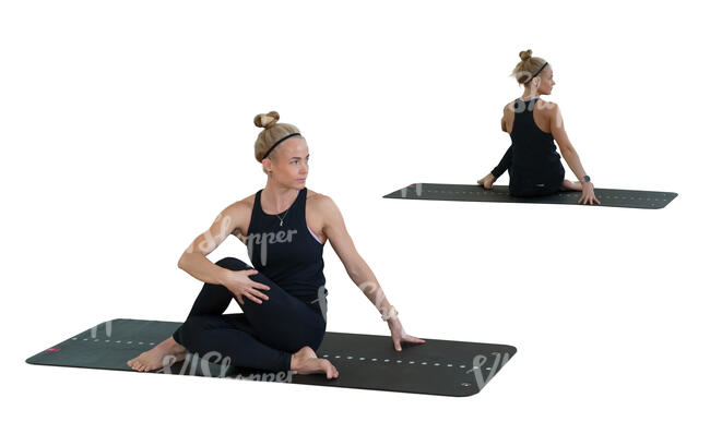 cut out woman doing yoga in front of the mirror