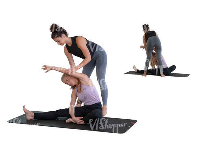 cut out yoga teacher instructing woman at a training