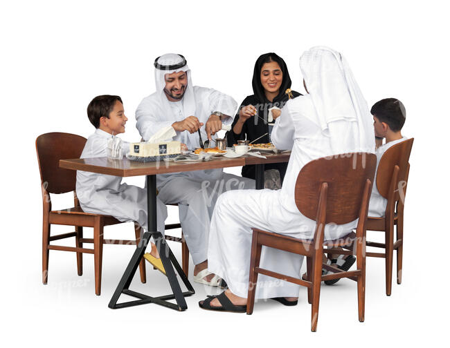 cut out arab family sitting in a restaurant and eating