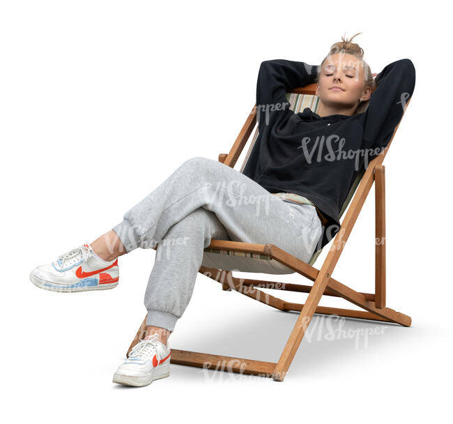 cut out teenage girl relaxing in the garden chair