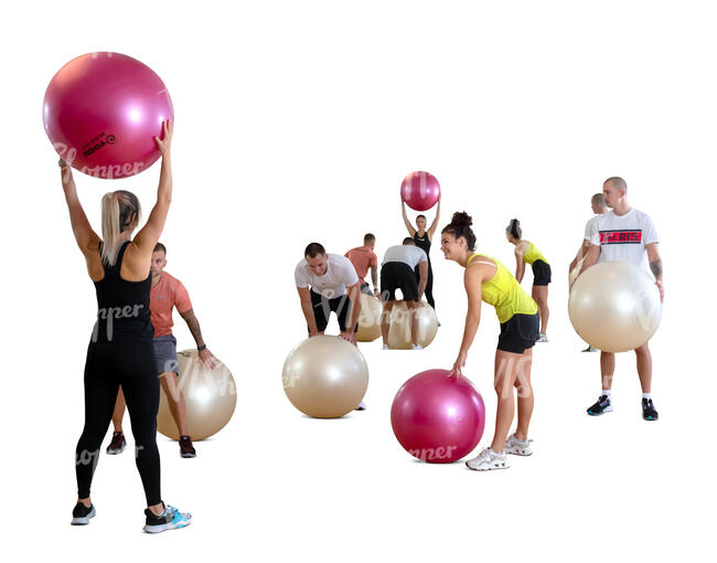 cut out group training with exercise balls in gym