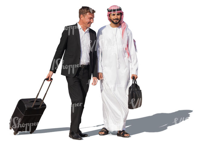 businessman and emirati man with suitcases walking