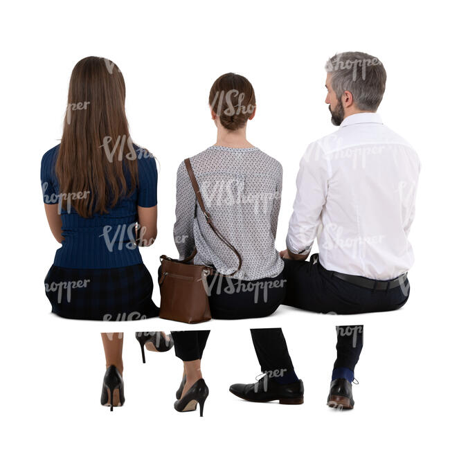 three cut out people sitting and watching smth
