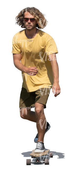 young man with curly hair riding a skateboard