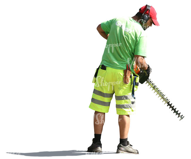 man working with a hedge trimmer