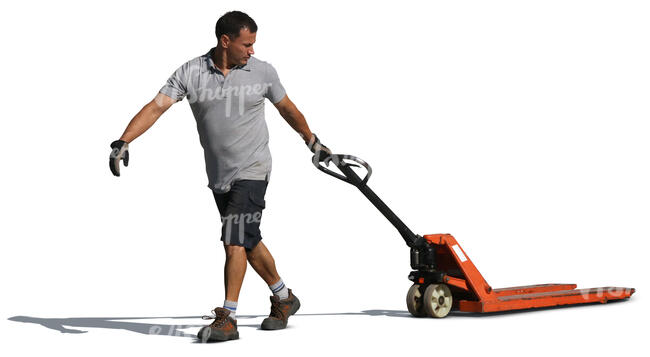 man pulling a hand pallet truck