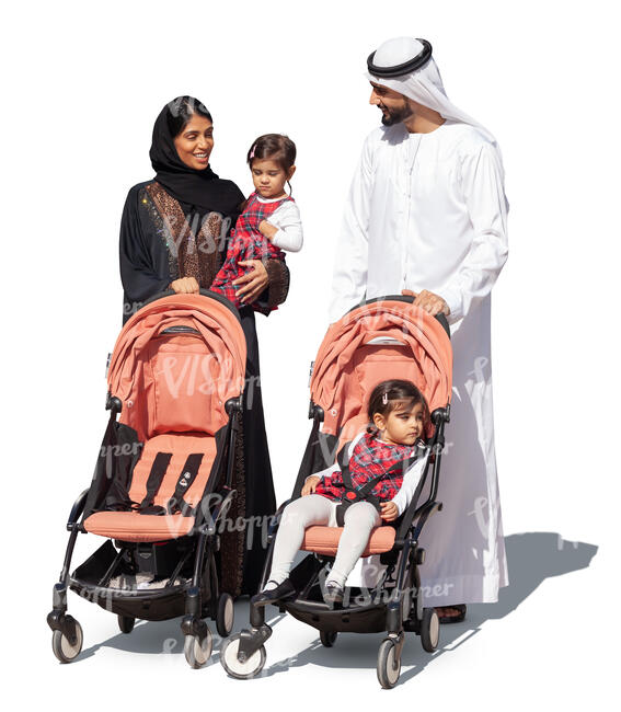 emiarati family with twin girls walking