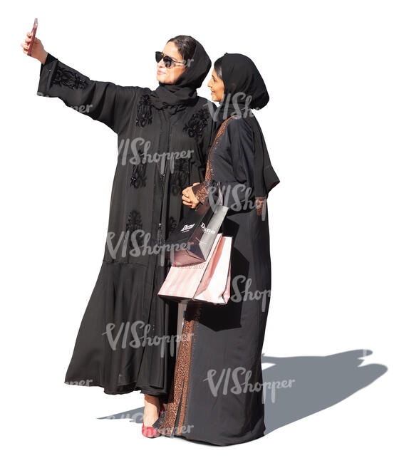 two muslim women taking a selfie