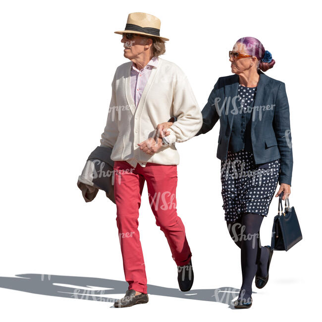 elderly couple walking arm in arm