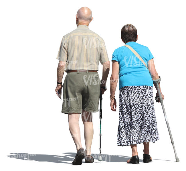 elderly man and woman walking with walking sticks