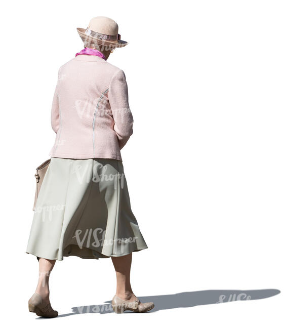 elderly woman with a hat walking