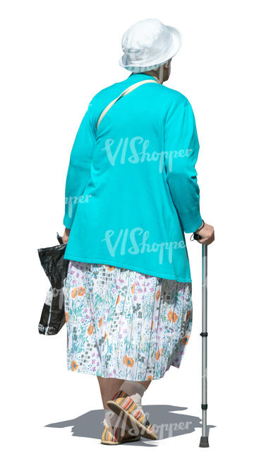 older woman with a walking stick walking