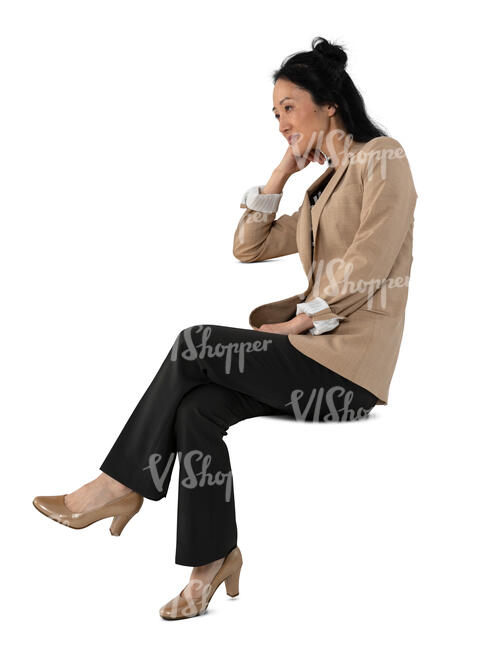 cut out asian woman sitting at a table