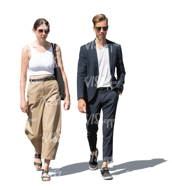 two cut out people walking in sunlight