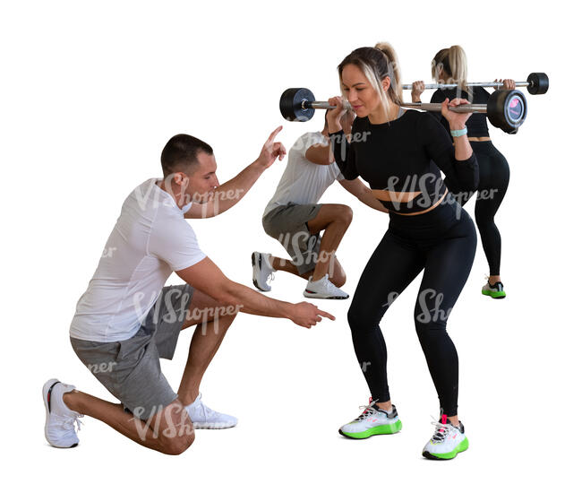 cut out personal trainer instructing a woman in gym