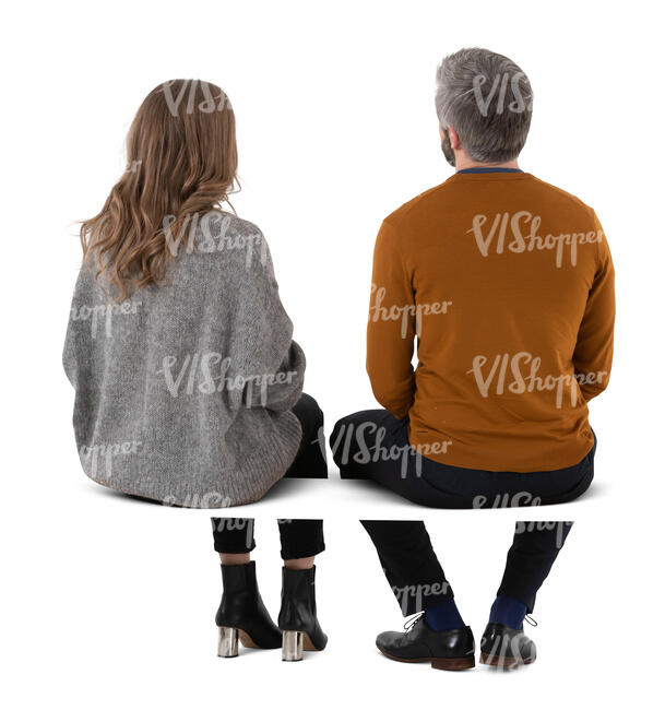 cut out man and woman sitting together seen from back angle