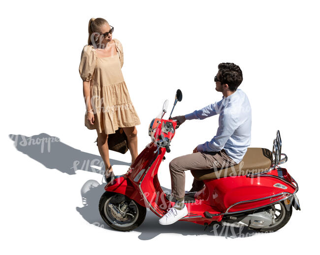 top view of a man on a vespa scooter talking to a woman