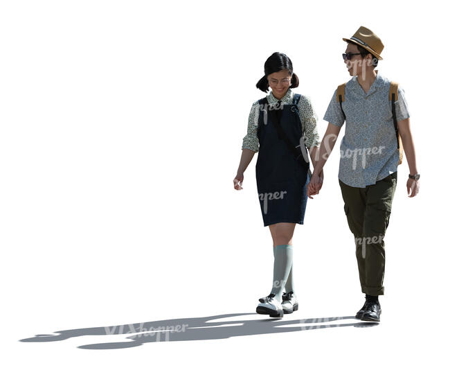 cut out asian backlit couple walking hand in hand