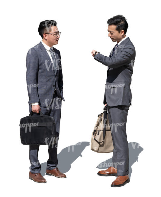 two cut out asian businessmen standing and talking