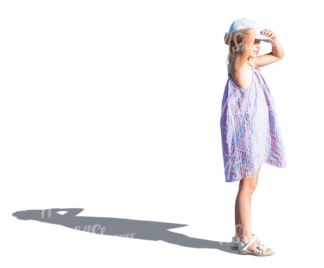 cut out little girl in a summer dress standing and looking