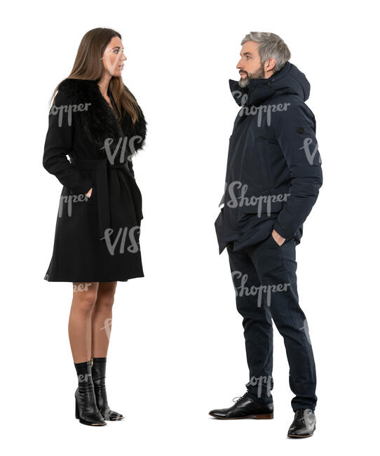 two cut out people in winter coats standing and talking