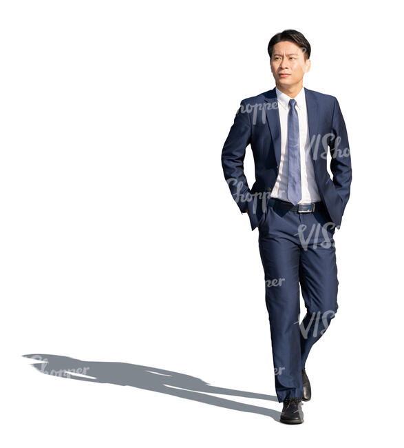 cut out asian man in a dark suit walking