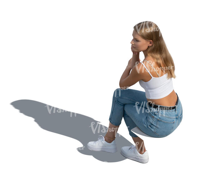 cut out woman sitting seen from above